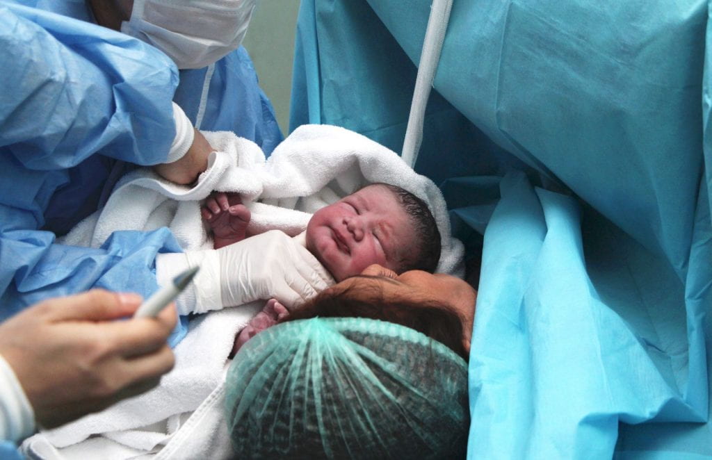 Newborn baby and Mother in hospital